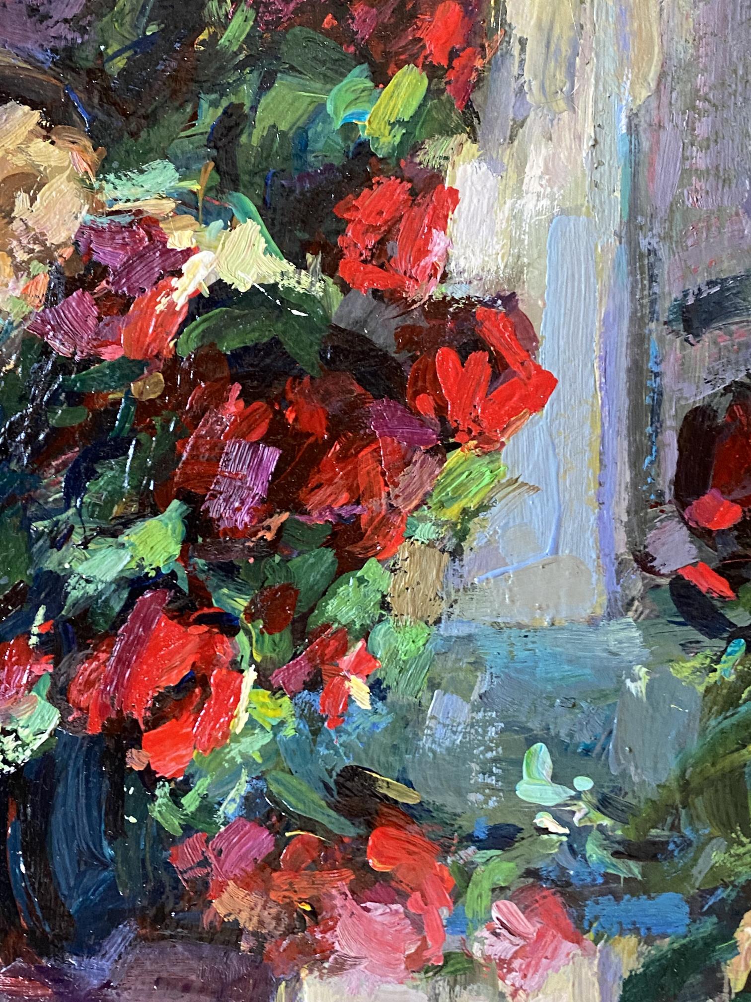 Oil painting Night still life by Ryman Evgeny Nikolaevich: vibrant red and green flowers in dark blue vase with bold brushstrokes