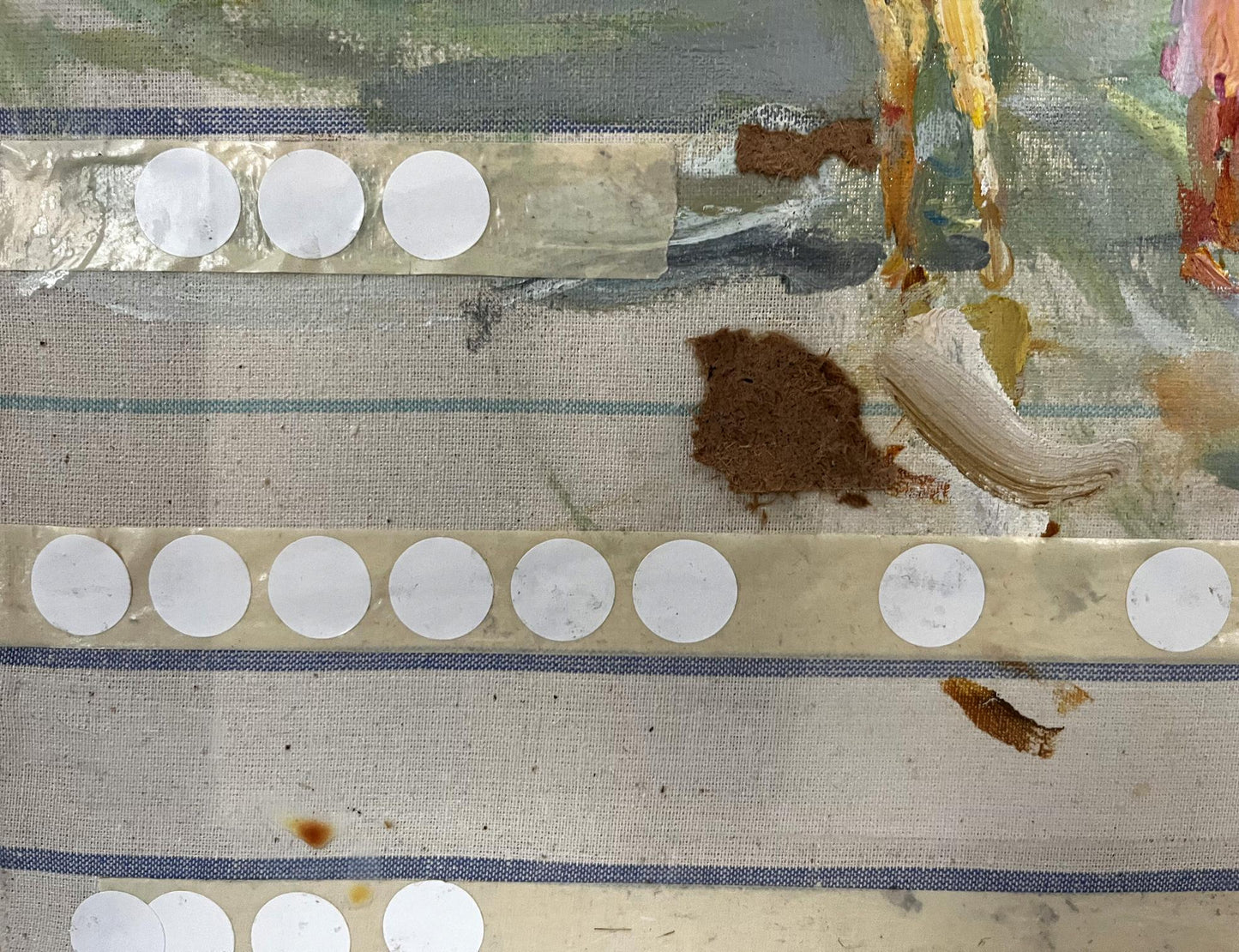 White circular stickers in rows on textured fabric for Barabash oil painting