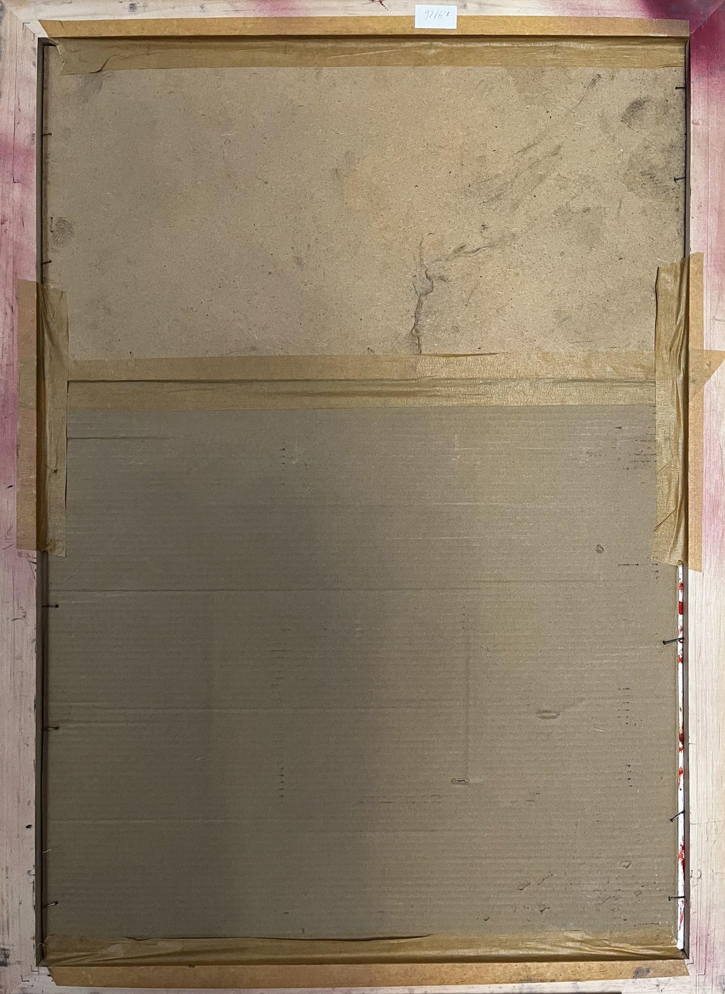 Back of Oil painting Portrait of a man Pavlov Victor with beige cardboard and tan tape in wooden frame