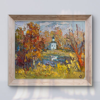 Oil painting Above the autumn lake by Oksana Ivanyuk with chapel and foliage