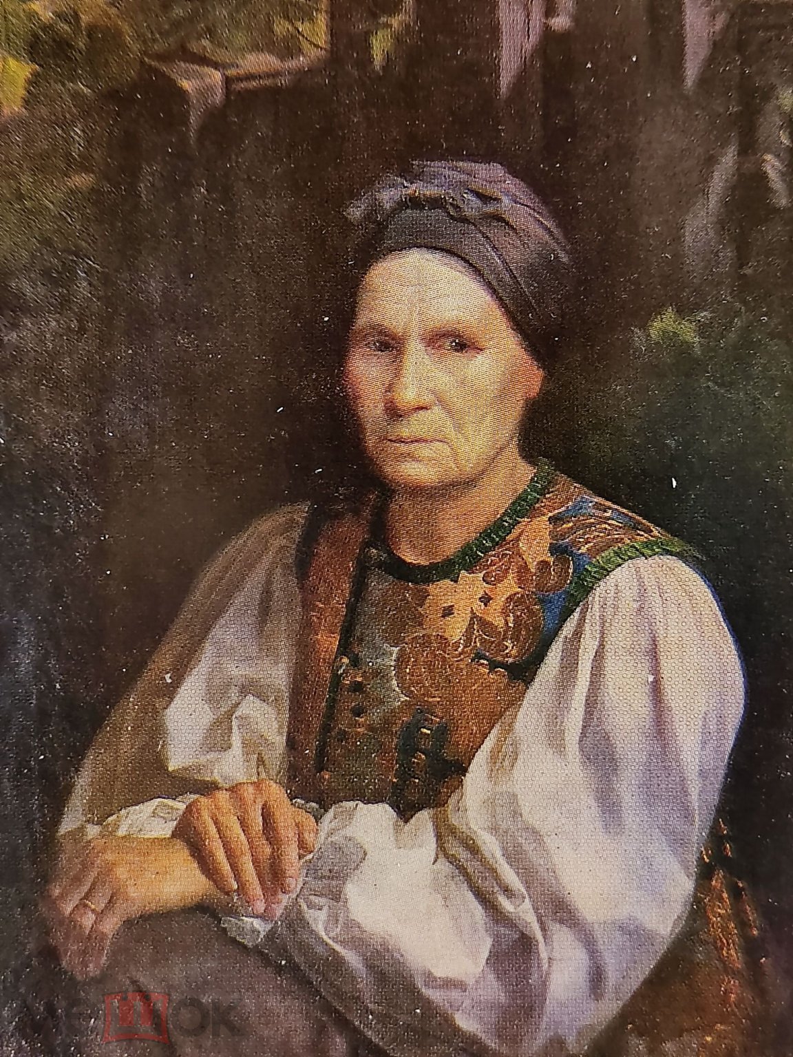 Elderly woman in dark headscarf and embroidered vest by Opanas Rokachevskyi