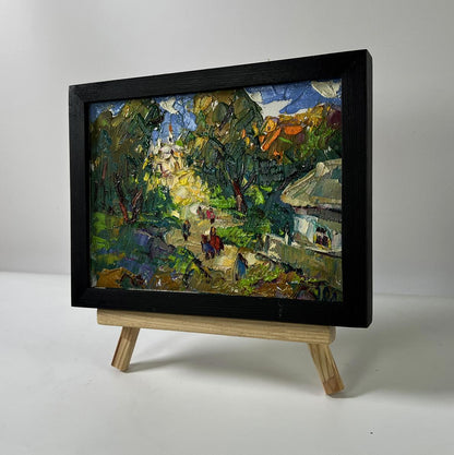 Oil painting Feast day in village by Oleksiy Ivanyuk in black frame
