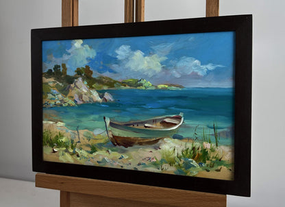 Oil painting Boat on the seashore by Yuriy Suprunchuk in black frame