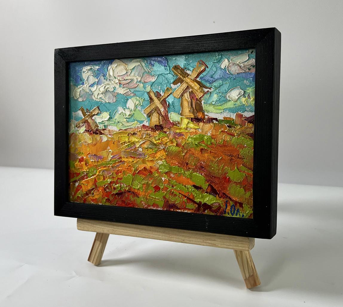 Vibrant impressionist oil painting of Oleksiy Ivanyuk windmills in colorful field, black frame