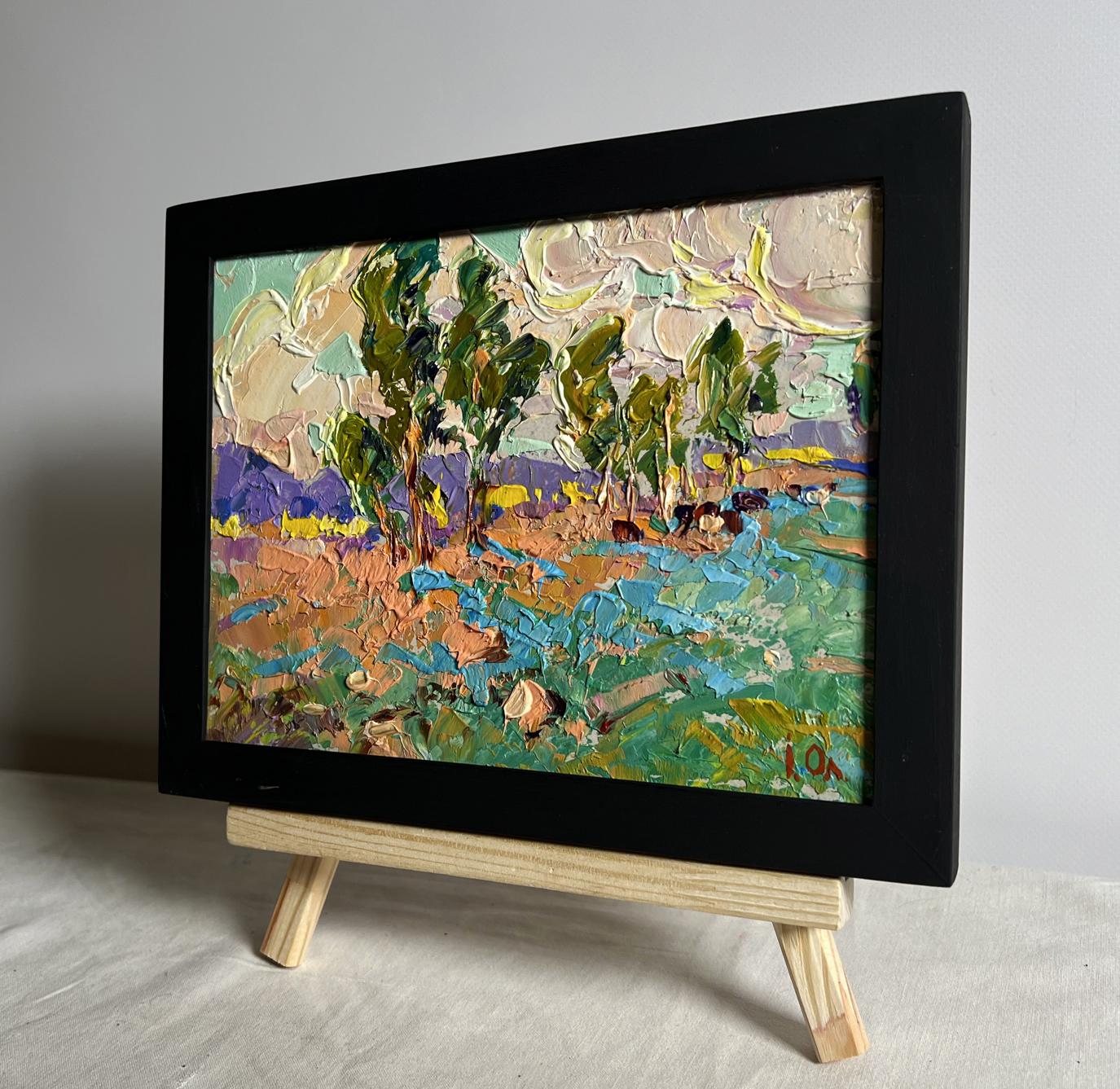 Oil painting In the autumn meadows by Oleksiy Ivanyuk in black frame