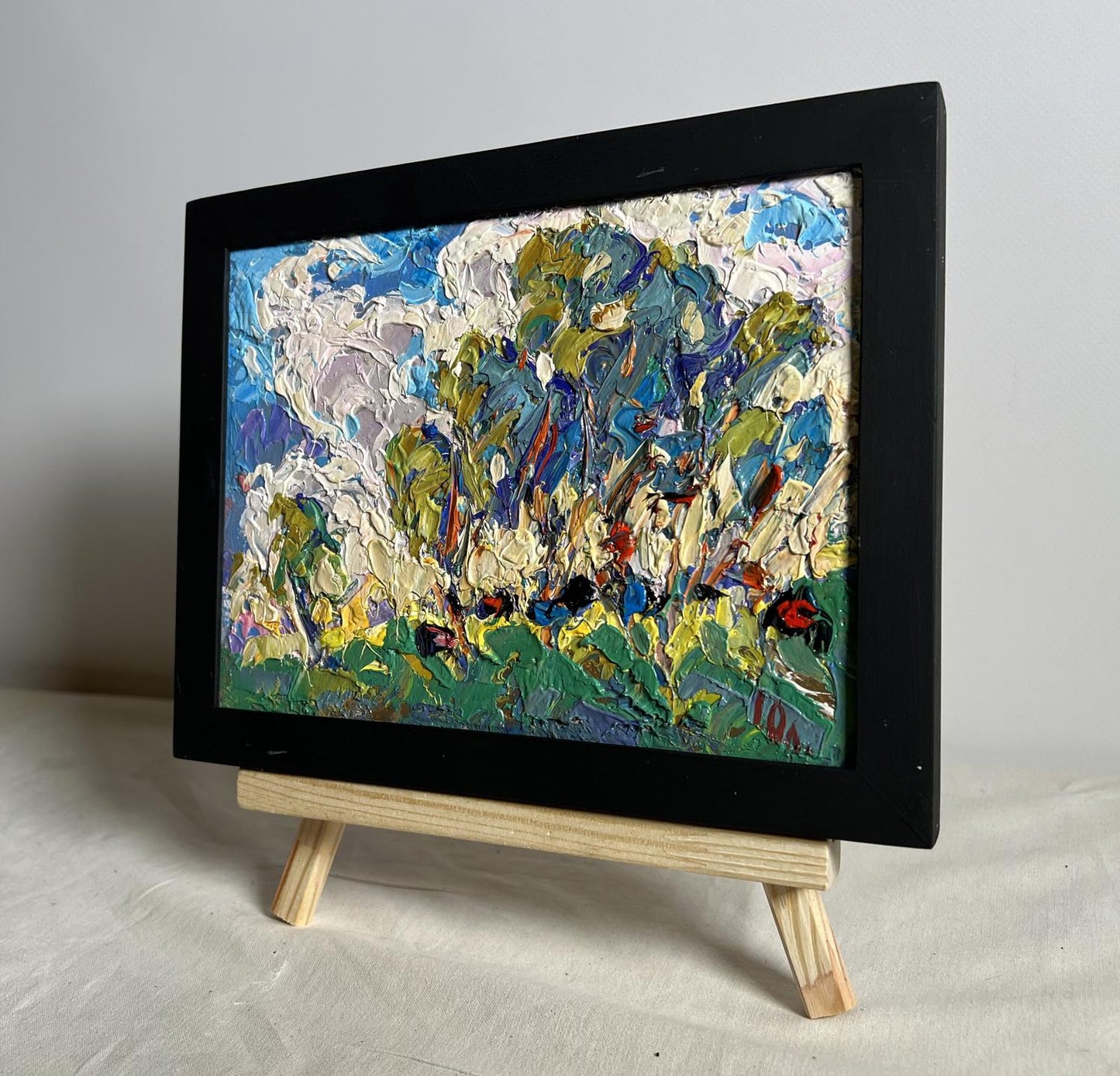 Oil painting Green rustle of grass by Oleksiy Ivanyuk in black frame