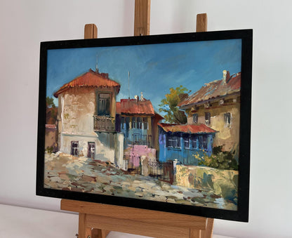 Oil painting Warm wind on the streets by Yuriy Suprunchuk, cobblestone scene