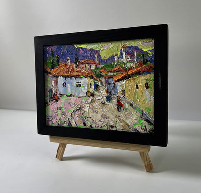 Vibrant impressionist oil painting of old residential town by Oleksiy Ivanyuk in black frame