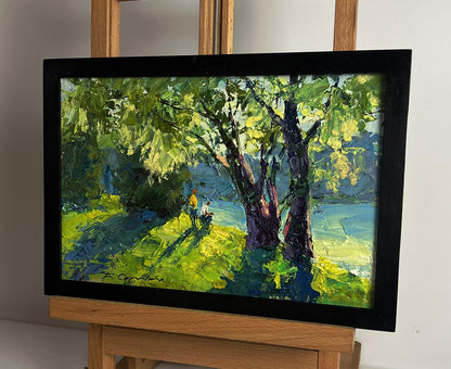 Oil painting Relaxing on the river by Boris Serdyuk in black frame