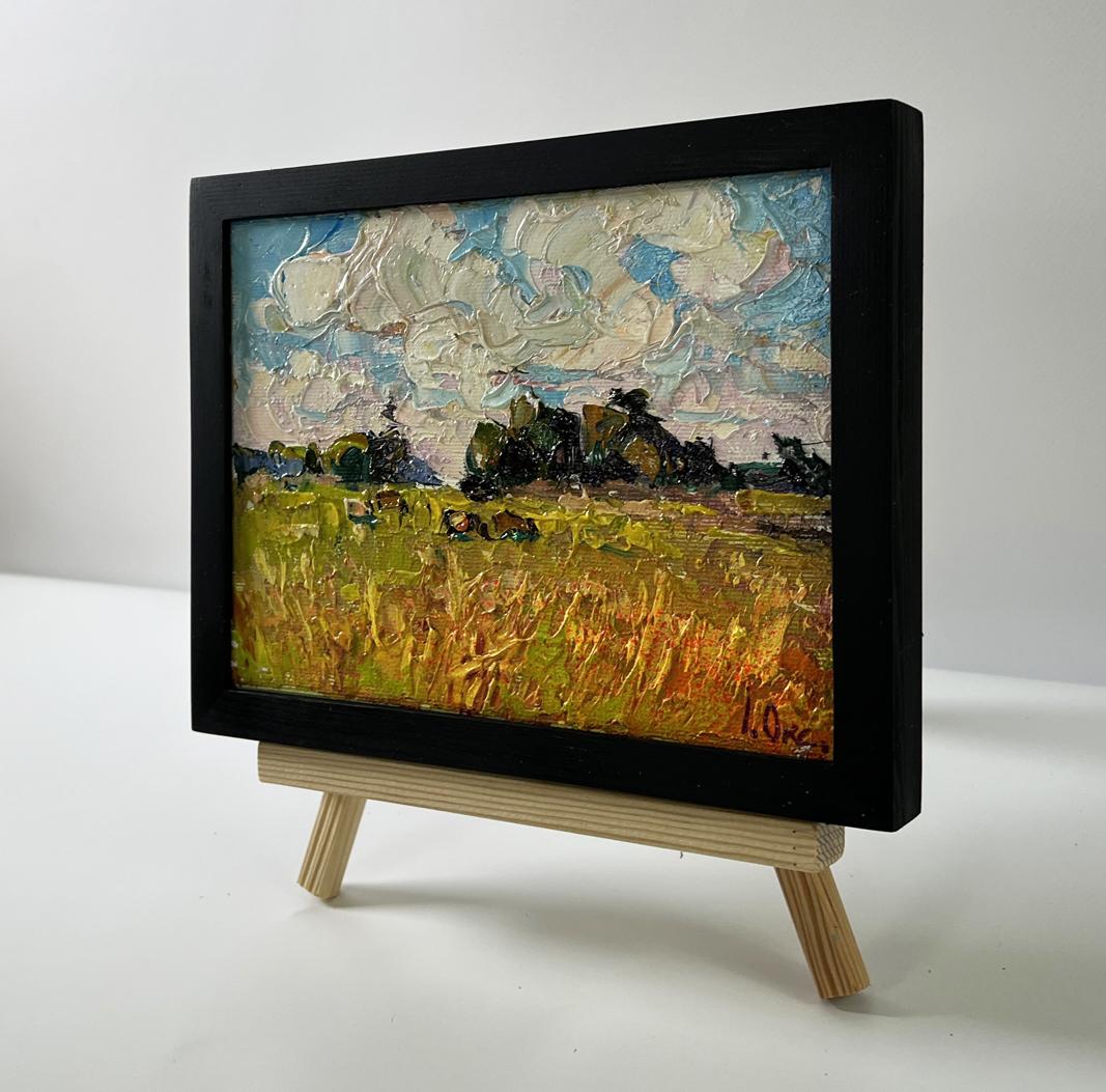 Oil painting of textured golden daytime field by Oksana Ivanyuk