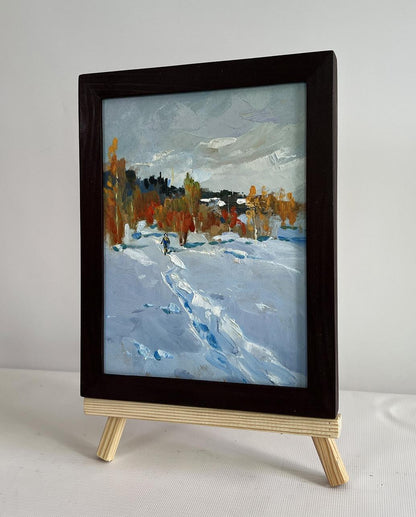 Oil painting Walking in the winter forest by Yuriy Suprunchuk in black frame