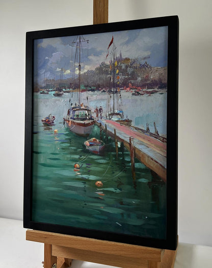 Framed oil painting of ship preparing to sail in harbor by Yuriy Suprunchuk