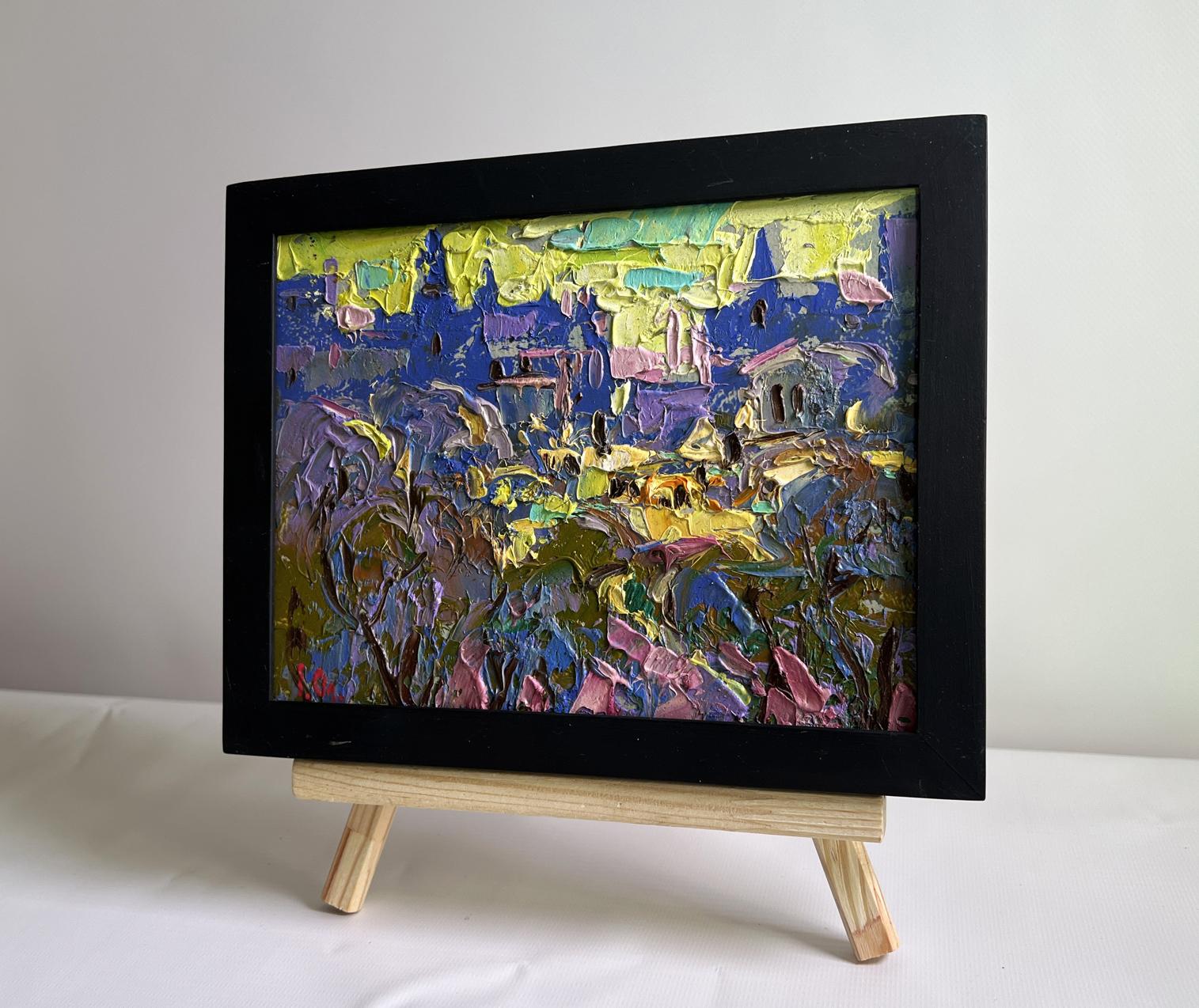 Oil painting by Oleksiy Ivanyuk: yellow sunset cityscape in black frame