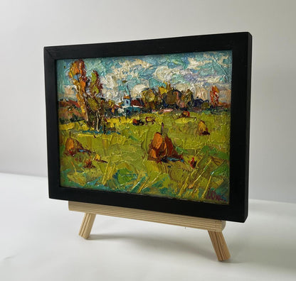 Oil painting Sunny day in the field by Oksana Ivanyuk, autumn scene in black frame