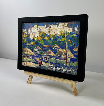 Black-framed miniature oil painting of Oleksiy Ivanyuk vibrant village in sunlight