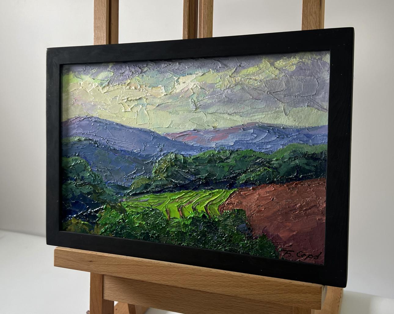 Oil painting of mountain sunset by Boris Serdyuk in black frame