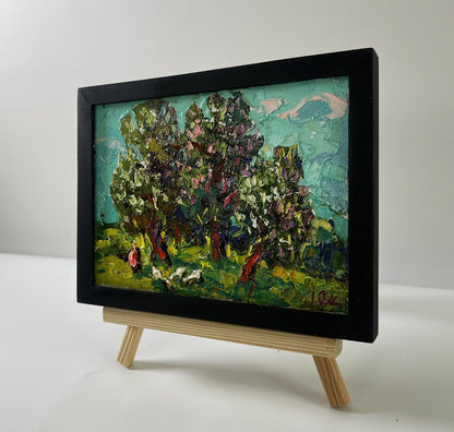 Oil painting Flowering chestnut trees by Oksana Ivanyuk in black frame