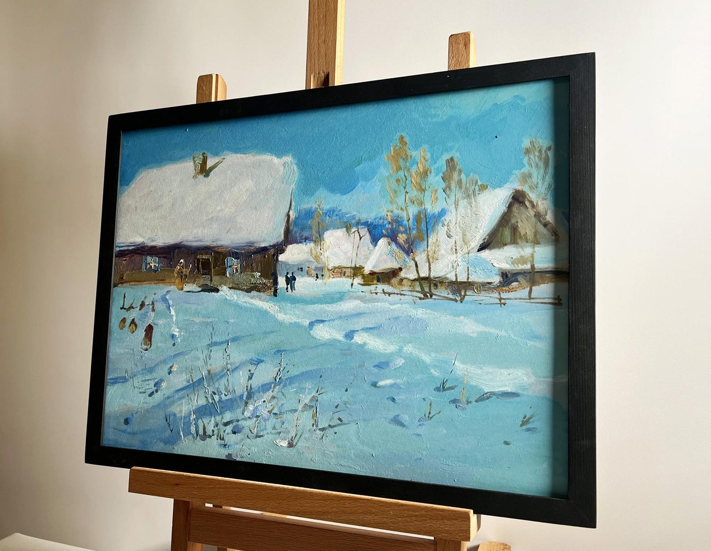 Oil painting Village Winter Tale by Yuriy Suprunchuk in black frame