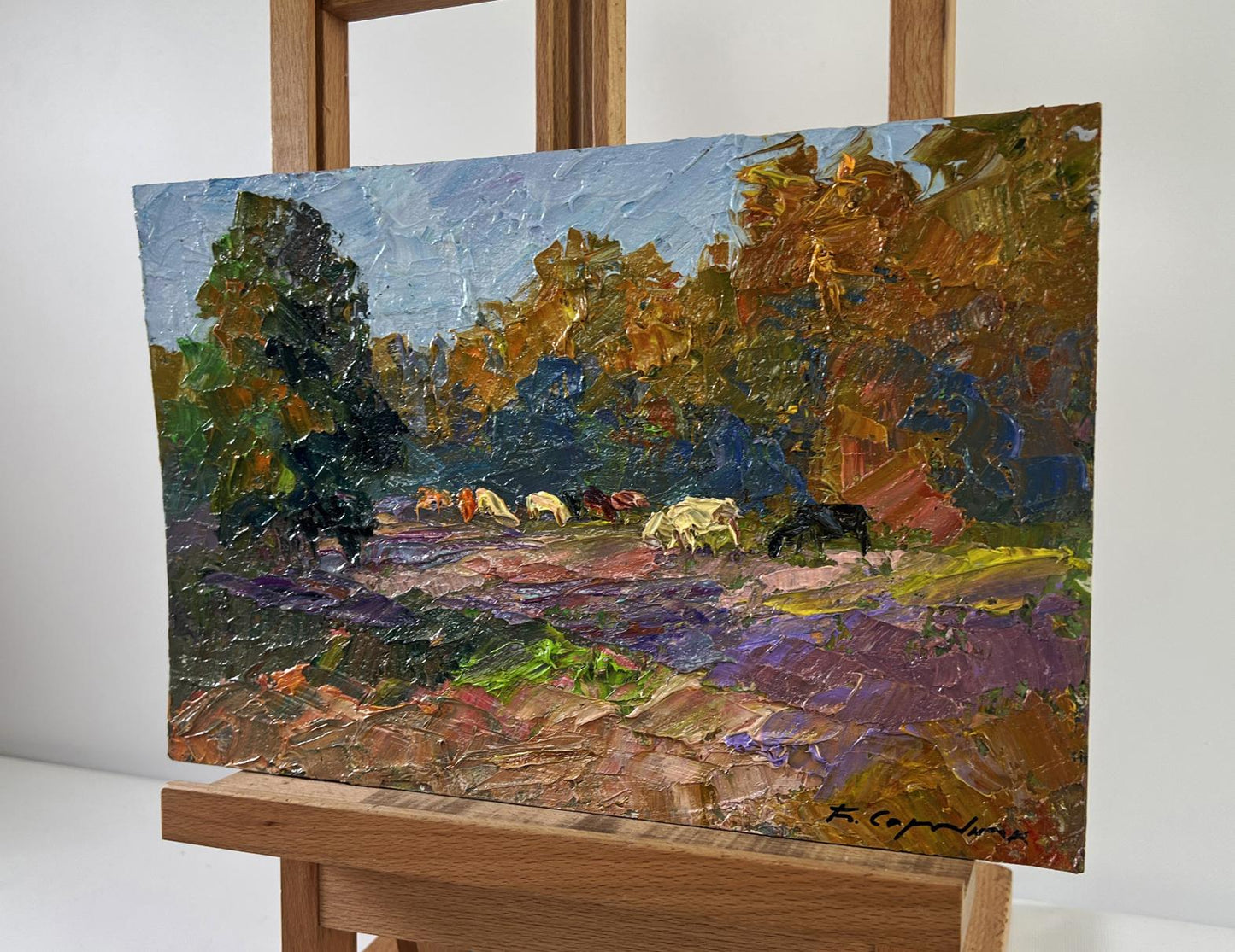 Oil painting of cows grazing by Boris Serdyuk