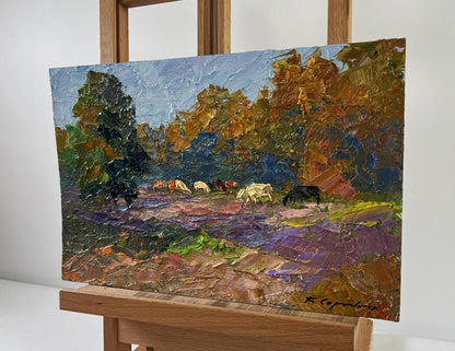 Oil painting of cows grazing by Boris Serdyuk