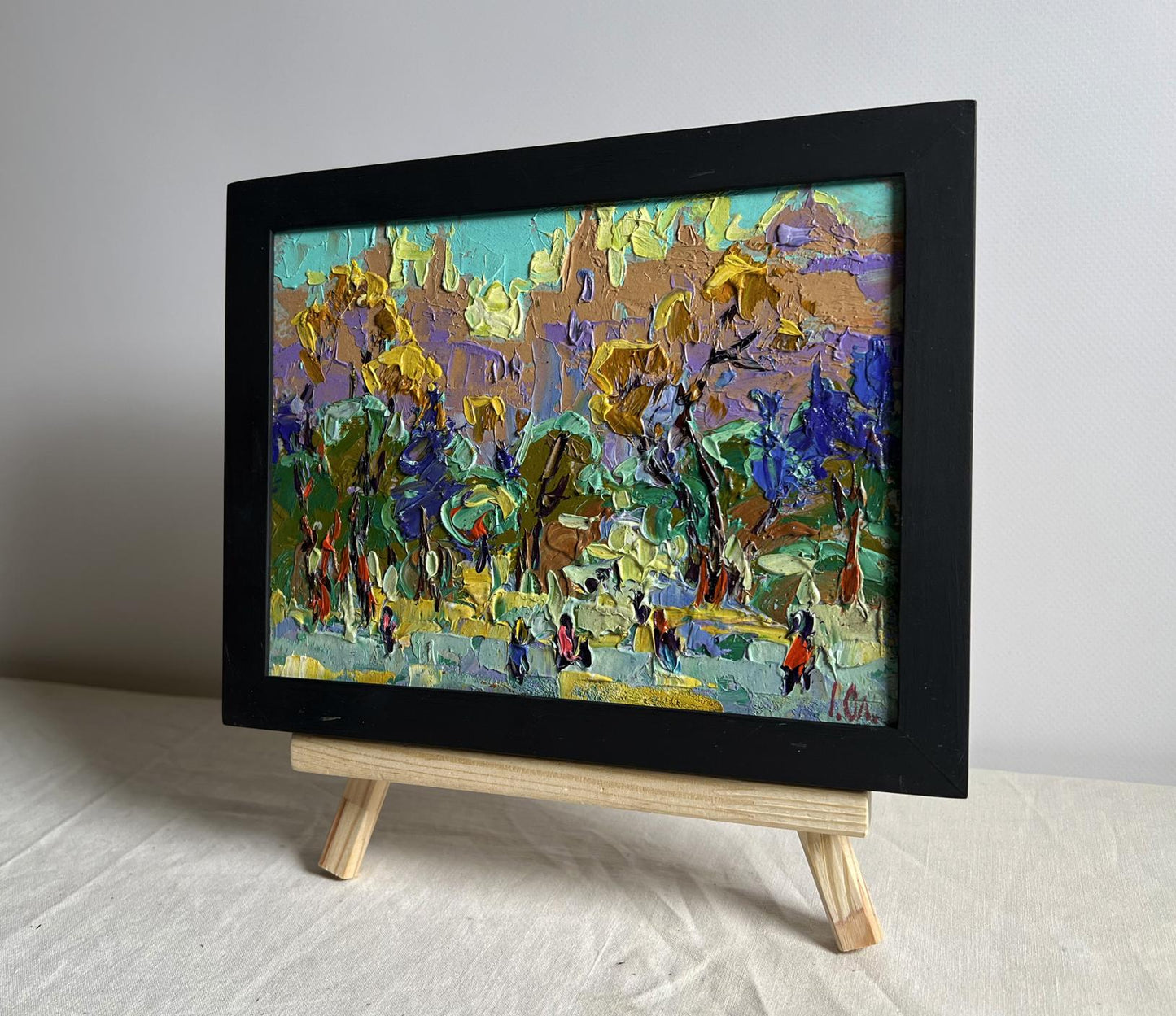 Oil painting Morning bustle of the city by Oleksiy Ivanyuk in black frame