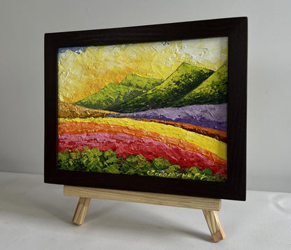 Oil painting of sunset behind mountains by V. Zadorozhnya in wooden frame