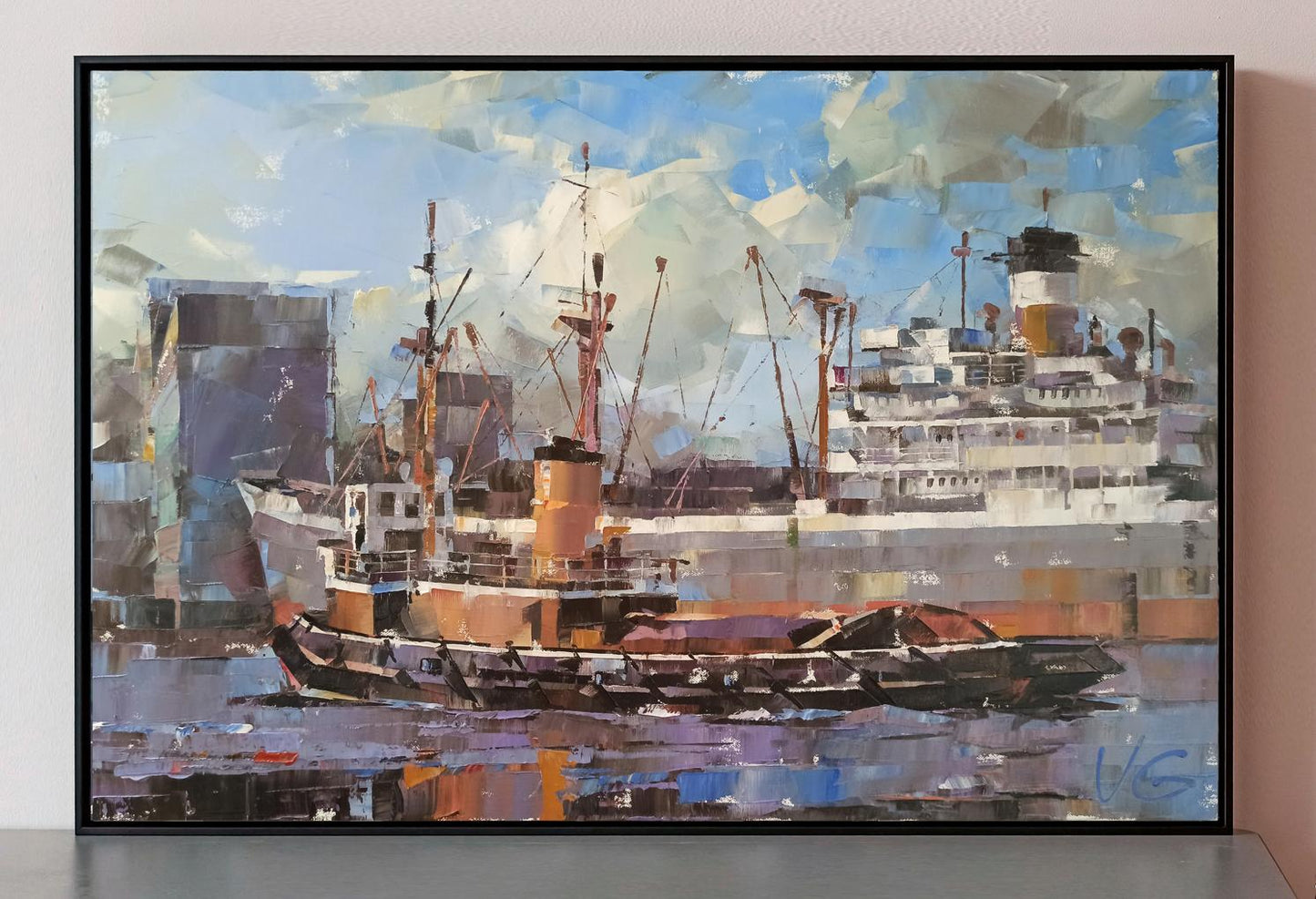 Framed oil painting of cargo ship and tugboat by Volodymyr Gluhomanyuk