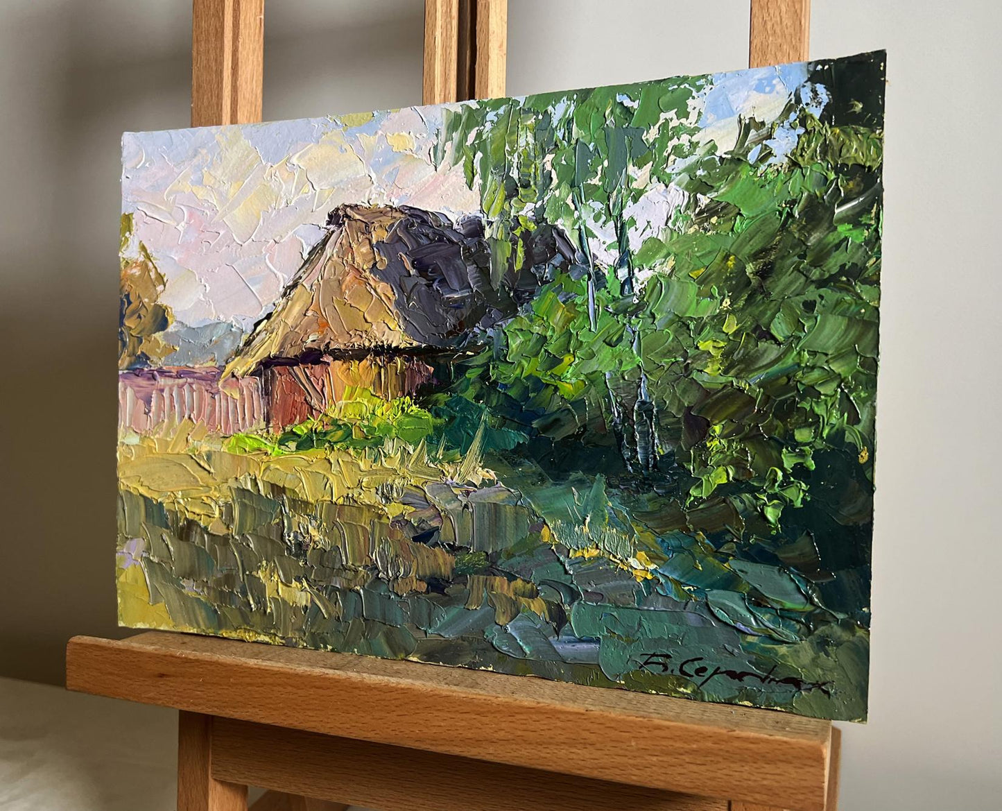 Oil painting of Boris Serdyuk house in field, textured thatched cottage among trees