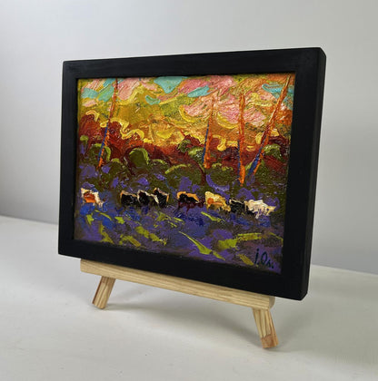 Oil painting Evening sky bathes the Earth by Oleksiy Ivanyuk on wooden easel