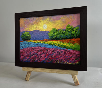 Oil painting Flower field in sunset glow by V. Zadorozhnya in dark frame