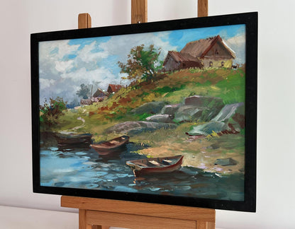 Oil painting The river carries village dreams by Yuriy Suprunchuk in black frame on easel