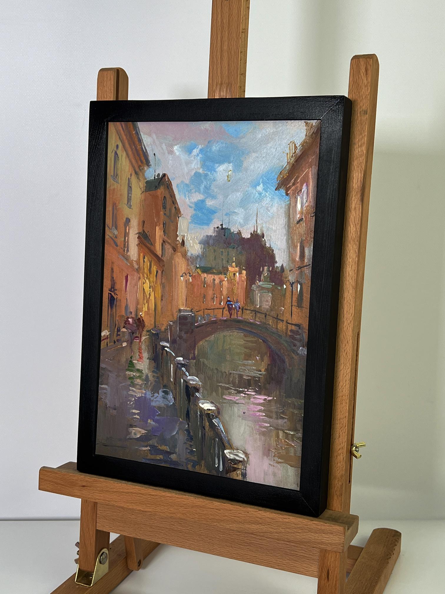 Oil painting by Yuriy Suprunchuk: canal with bridge on wooden easel