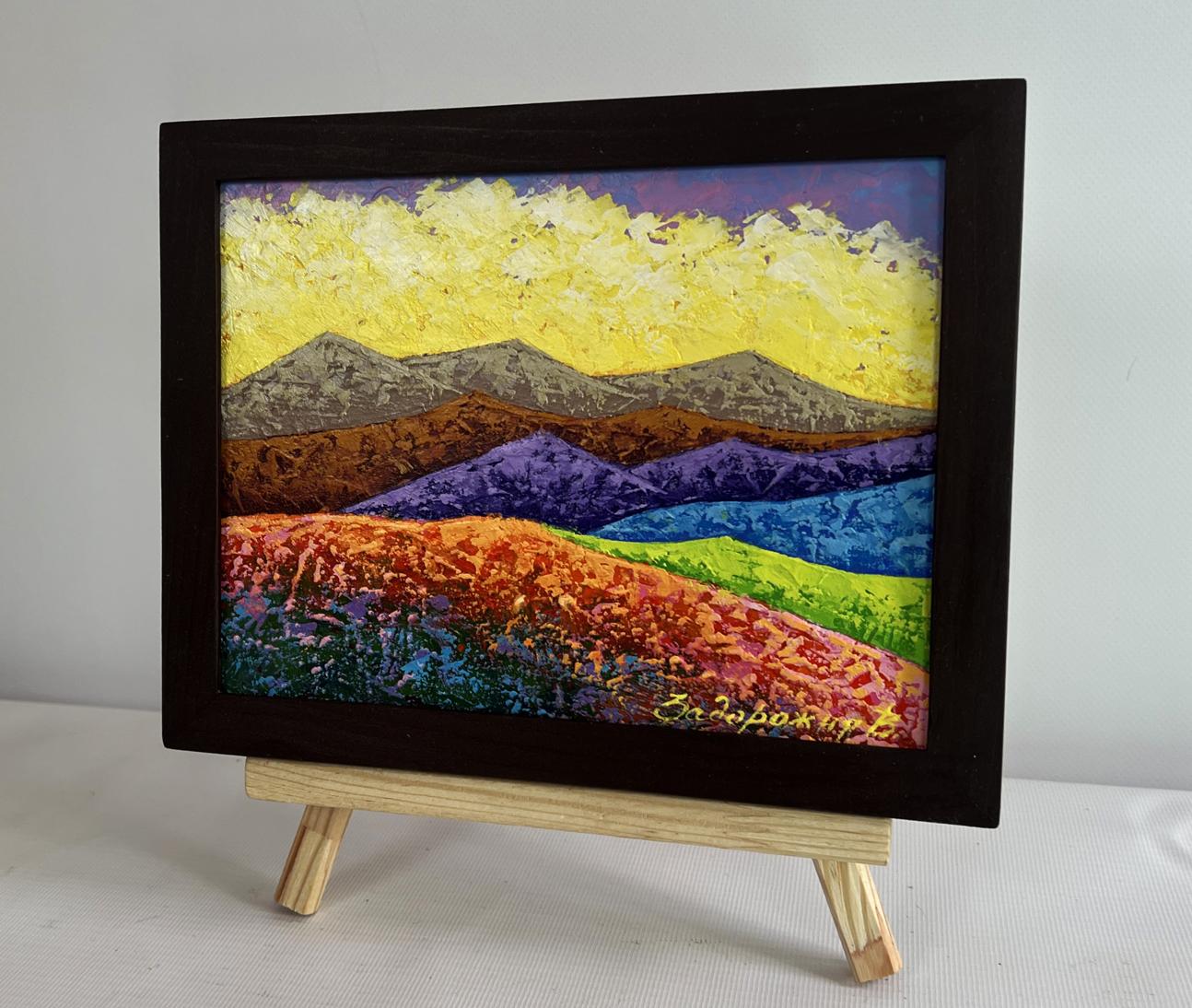Oil painting by V. Zadorozhnya: textured mountains, fields, yellow sky in black frame