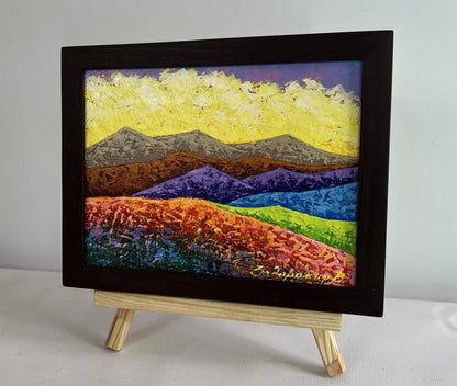 Oil painting by V. Zadorozhnya: textured mountains, fields, yellow sky in black frame