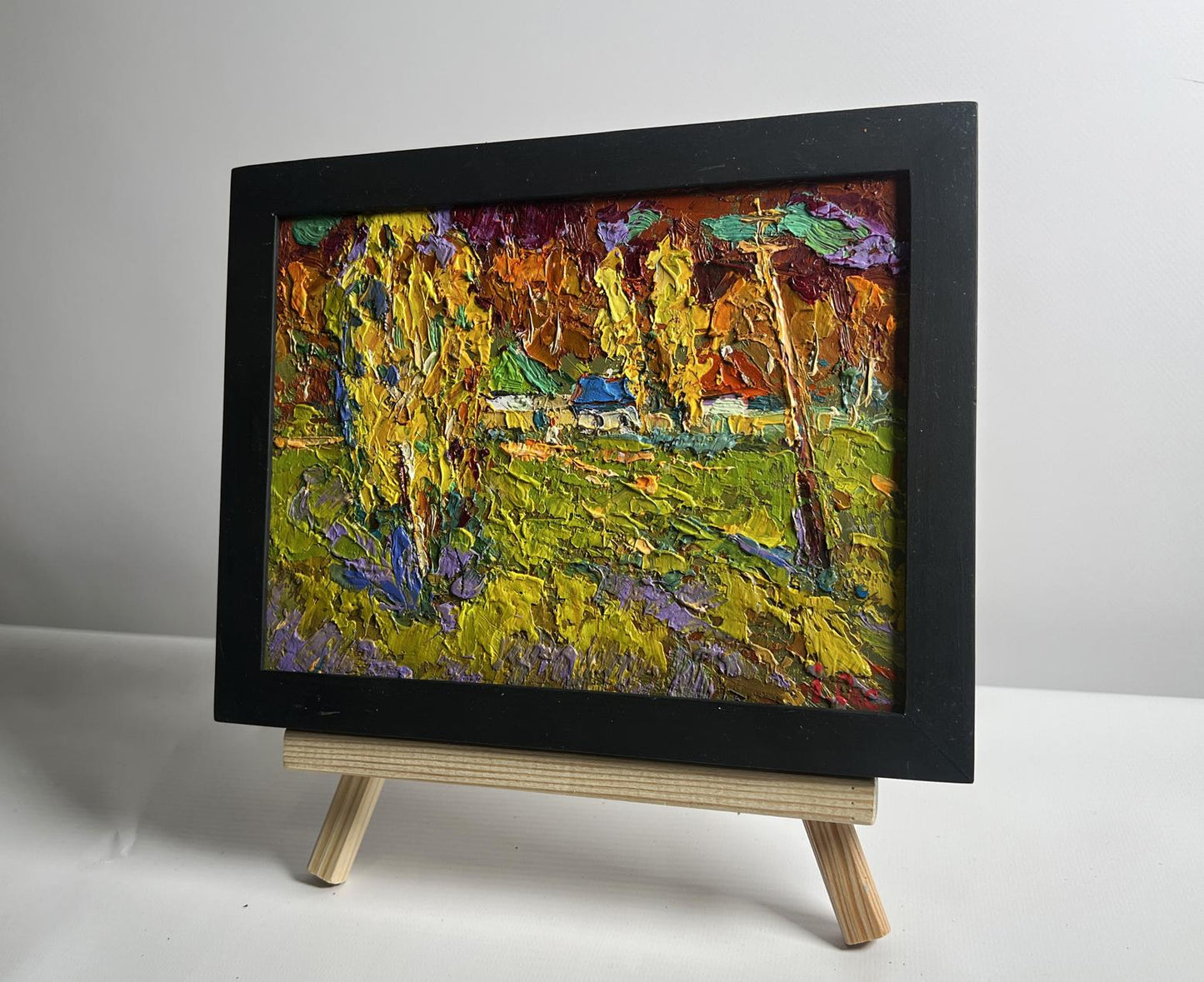 Oil painting Autumn streets of the village by Oksana Ivanyuk in black frame