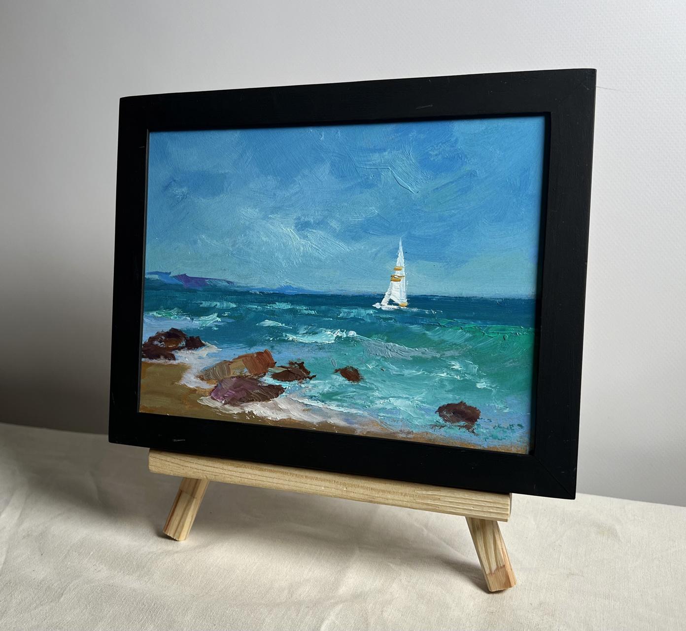 Framed oil painting of lonely sailboat at sea by Yuriy Suprunchuk
