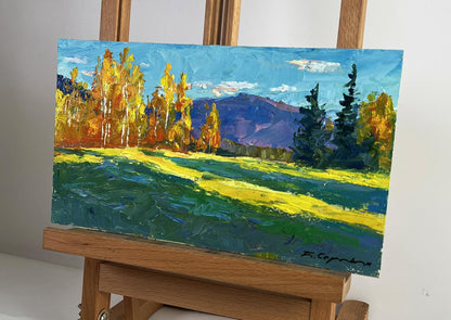 Oil painting Golden birch forest by Boris Serdyuk on wooden easel