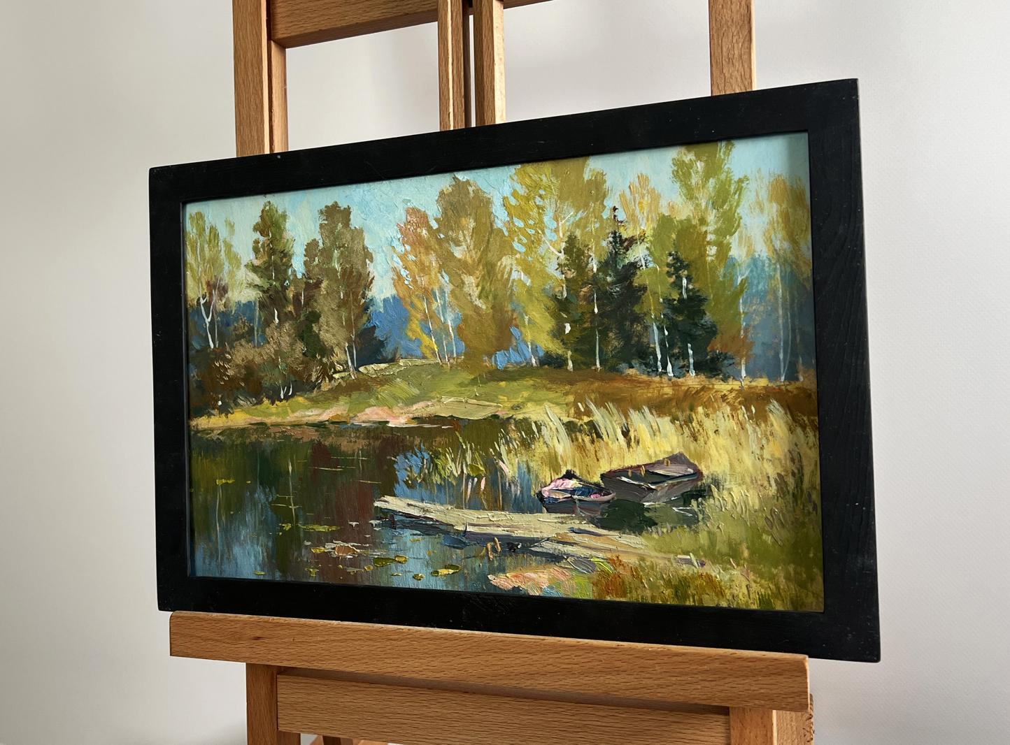 Framed oil painting of forest reflection in pond by Yuriy Suprunchuk