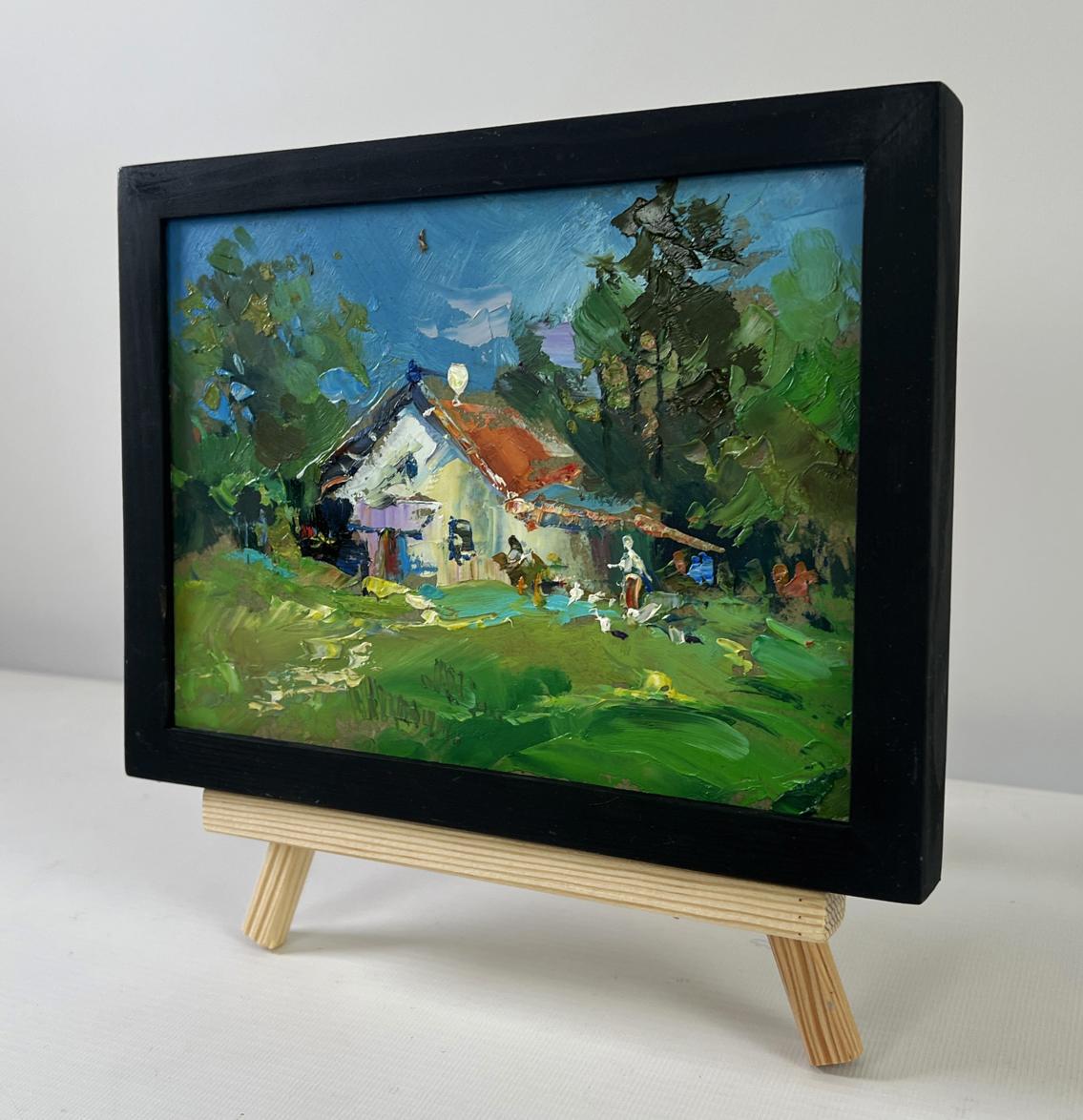 Oil painting Quiet village life by Yuriy Suprunchuk on wooden easel