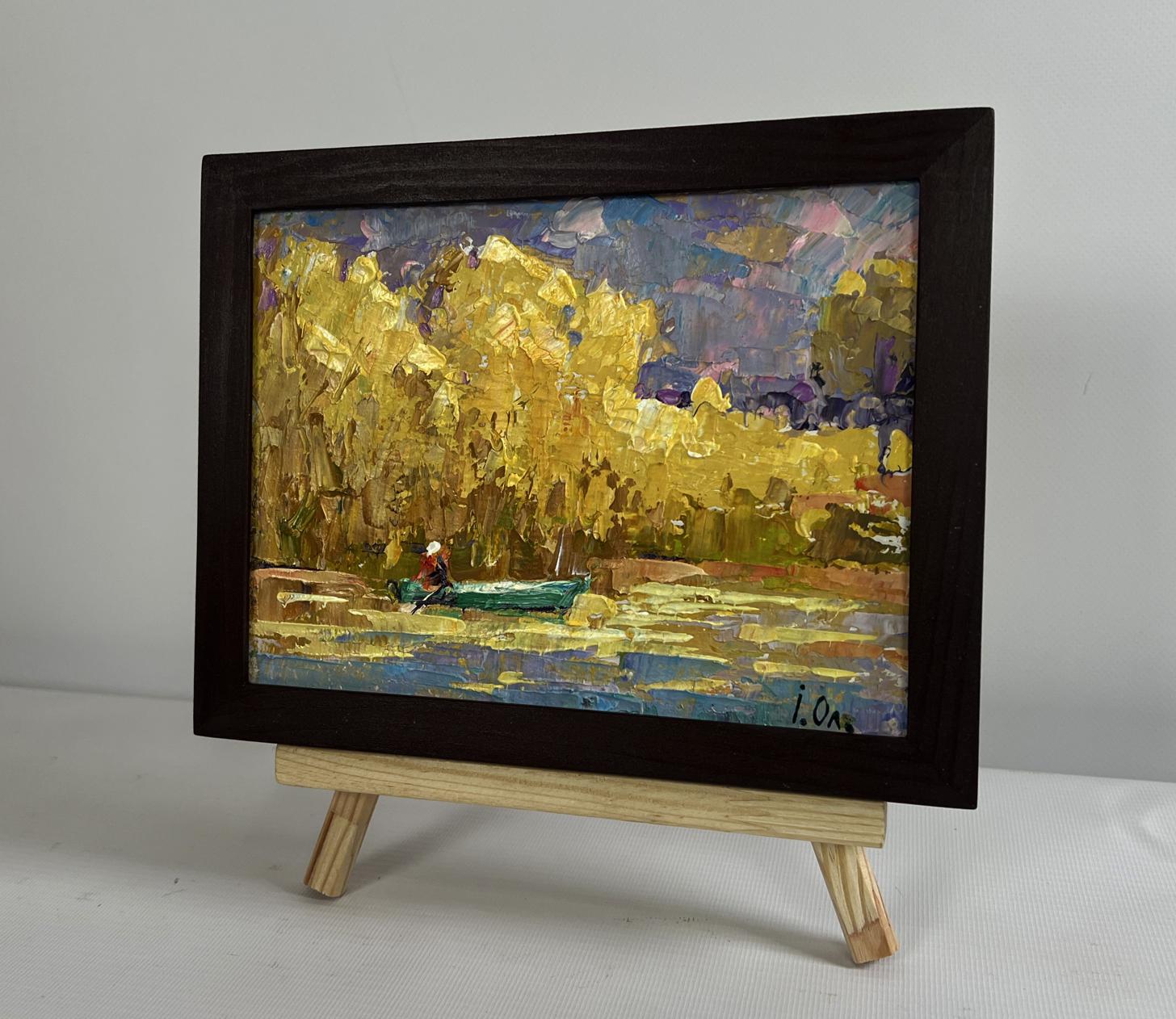 Oil painting On the autumn lake by Oleksiy Ivanyuk, green boat amid golden trees