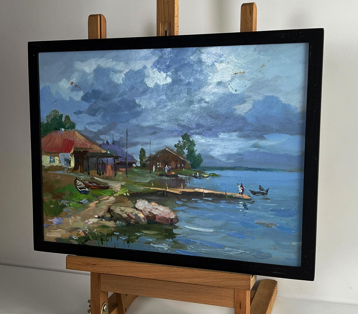 Oil painting of houses near river bank by Yuriy Suprunchuk