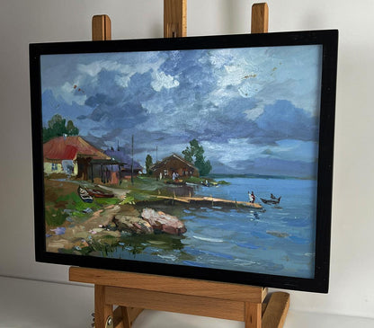 Oil painting of houses near river bank by Yuriy Suprunchuk