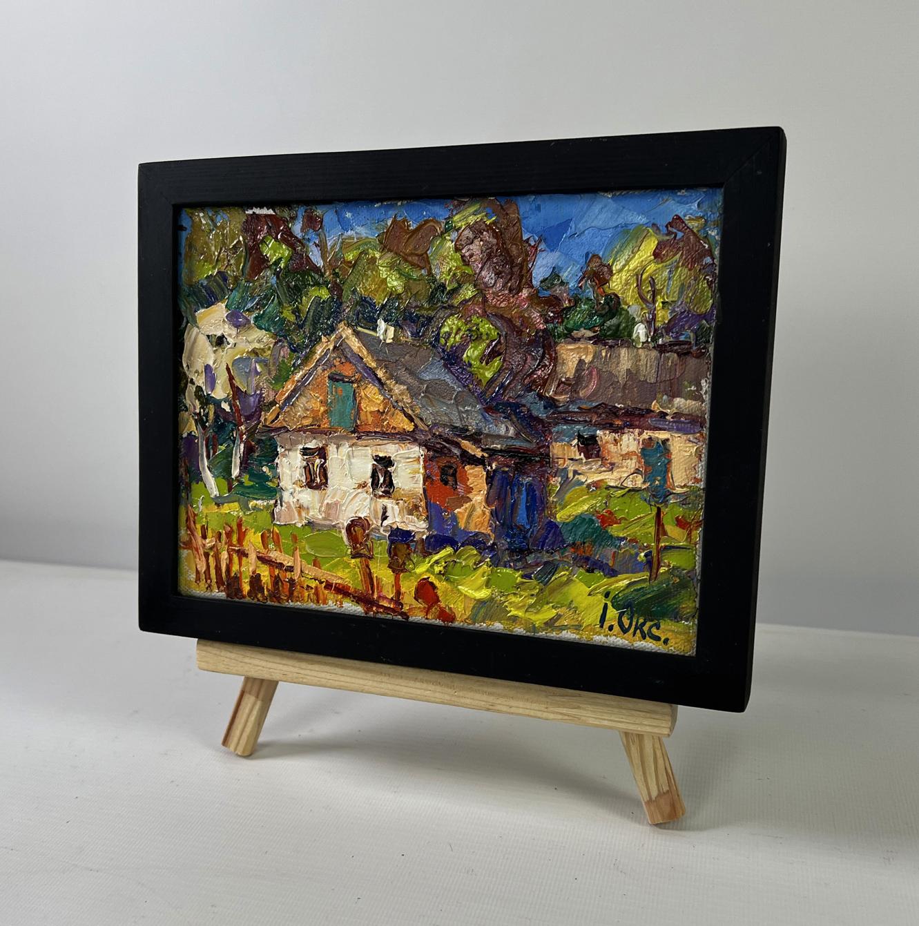 Vibrant impressionist oil painting of village under summer sky by Oksana Ivanyuk in black frame