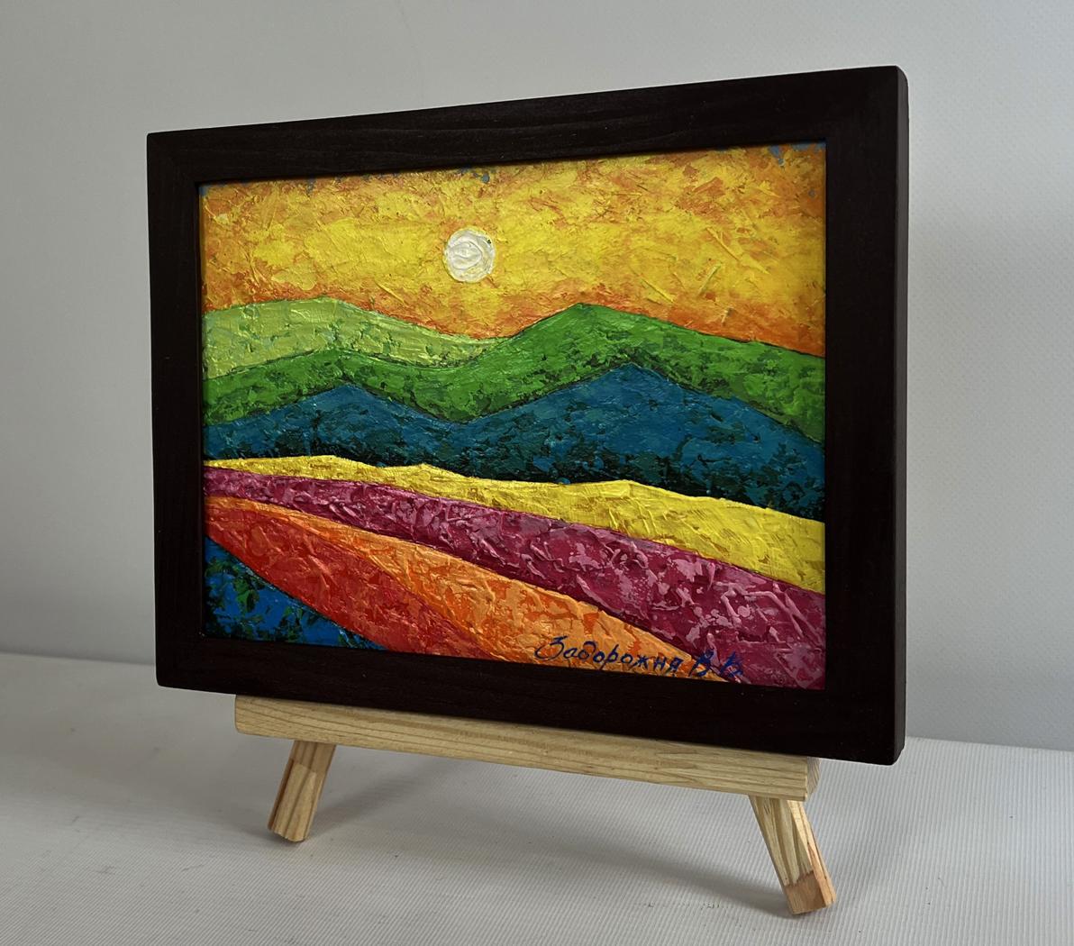 Oil painting of flower meadow silhouettes by V. Zadorozhnya in dark frame