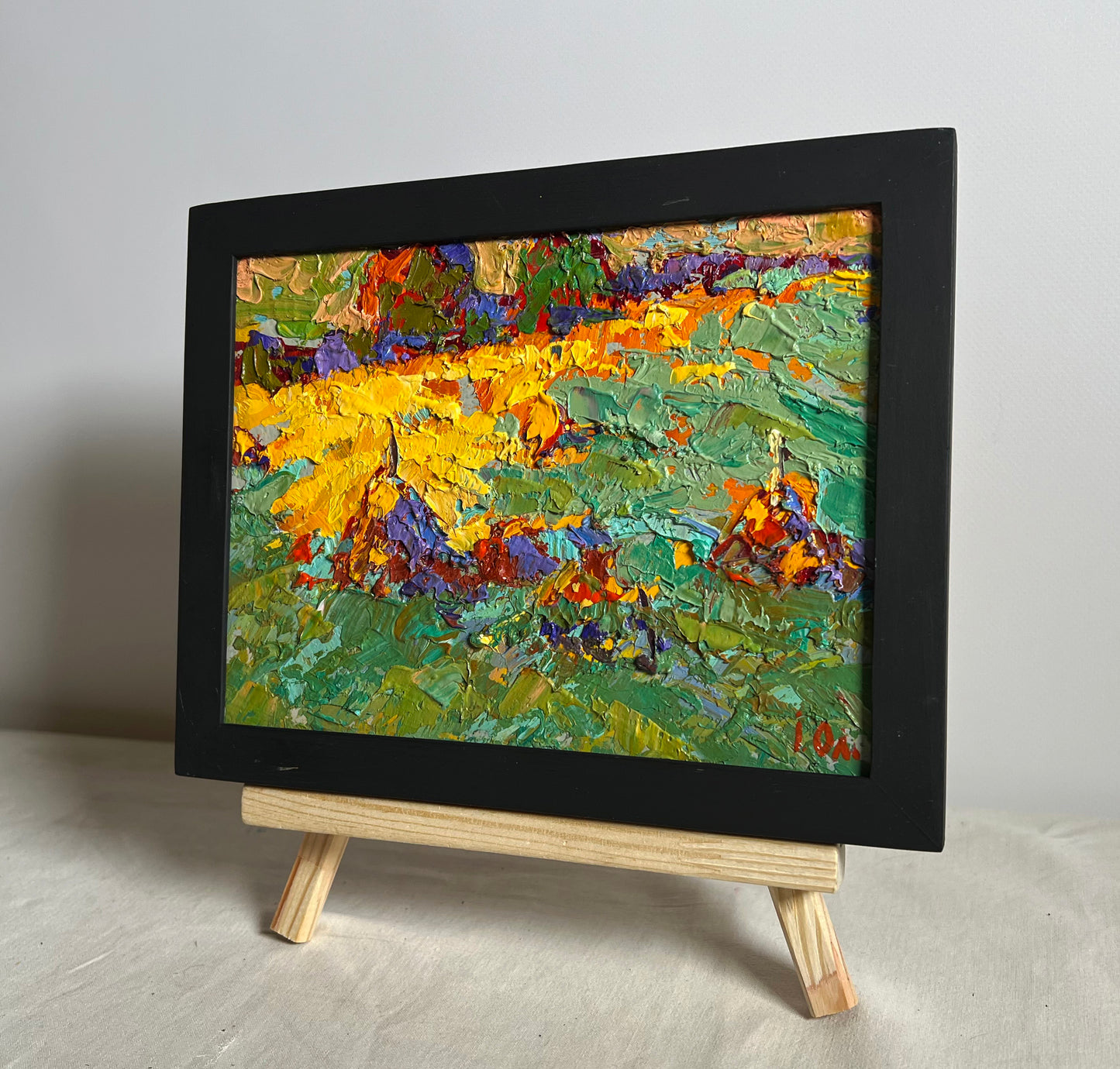 Oil painting The last ray of sunshine by Oleksiy Ivanyuk in black frame