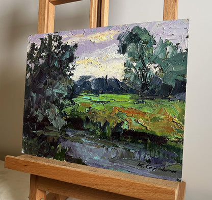 Oil painting In the evening on the meadow by Boris Serdyuk, lush green landscape
