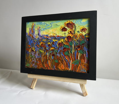 Oil painting of yellow sunset over sunflowers by Oleksiy Ivanyuk
