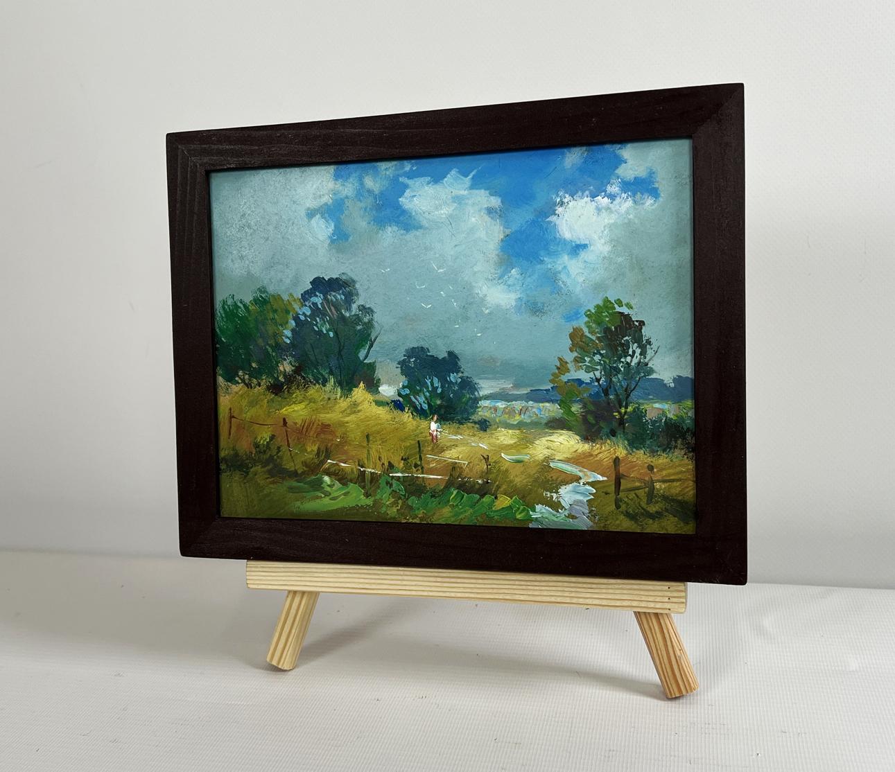 Oil painting Warm breath of the field by Yuriy Suprunchuk in dark wood frame