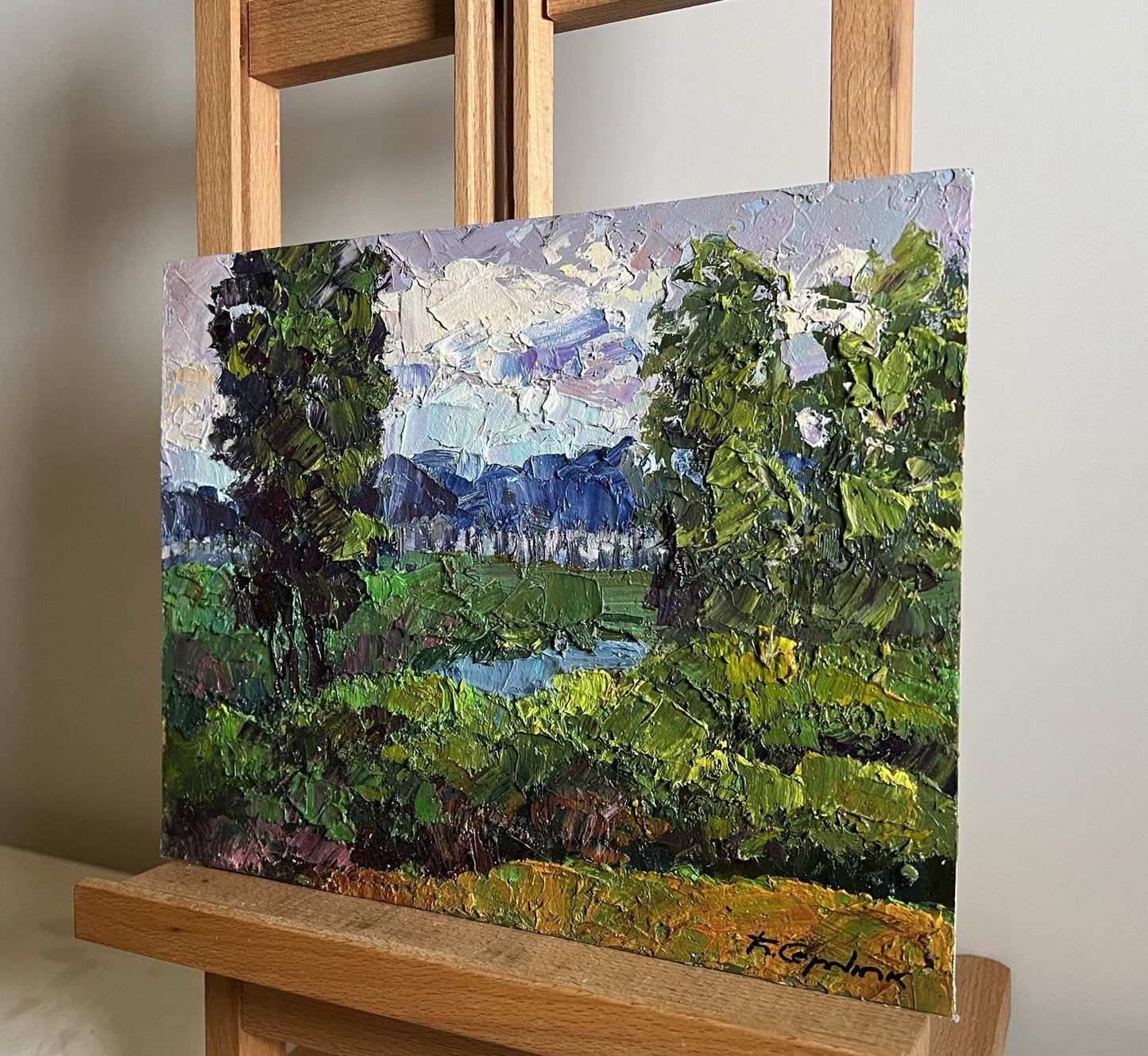 Oil painting Its getting dark by Boris Serdyuk: lush green trees, hills, soft sky