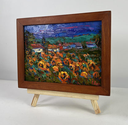 Oil painting of summer village life with orange flowers by Oksana Ivanyuk